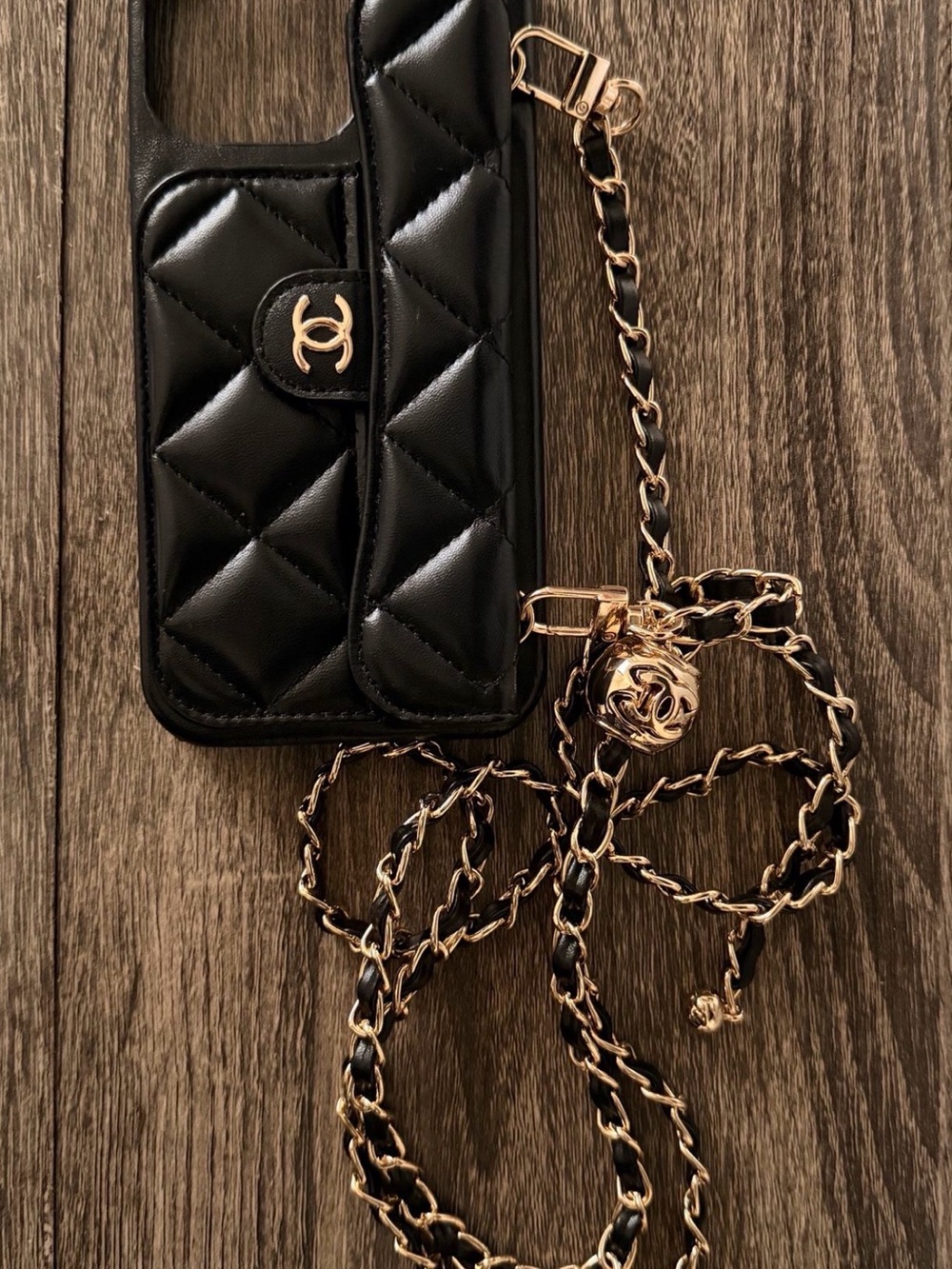 CHANEL Black Quilted Leather Phone Crossbody with Gold Chain